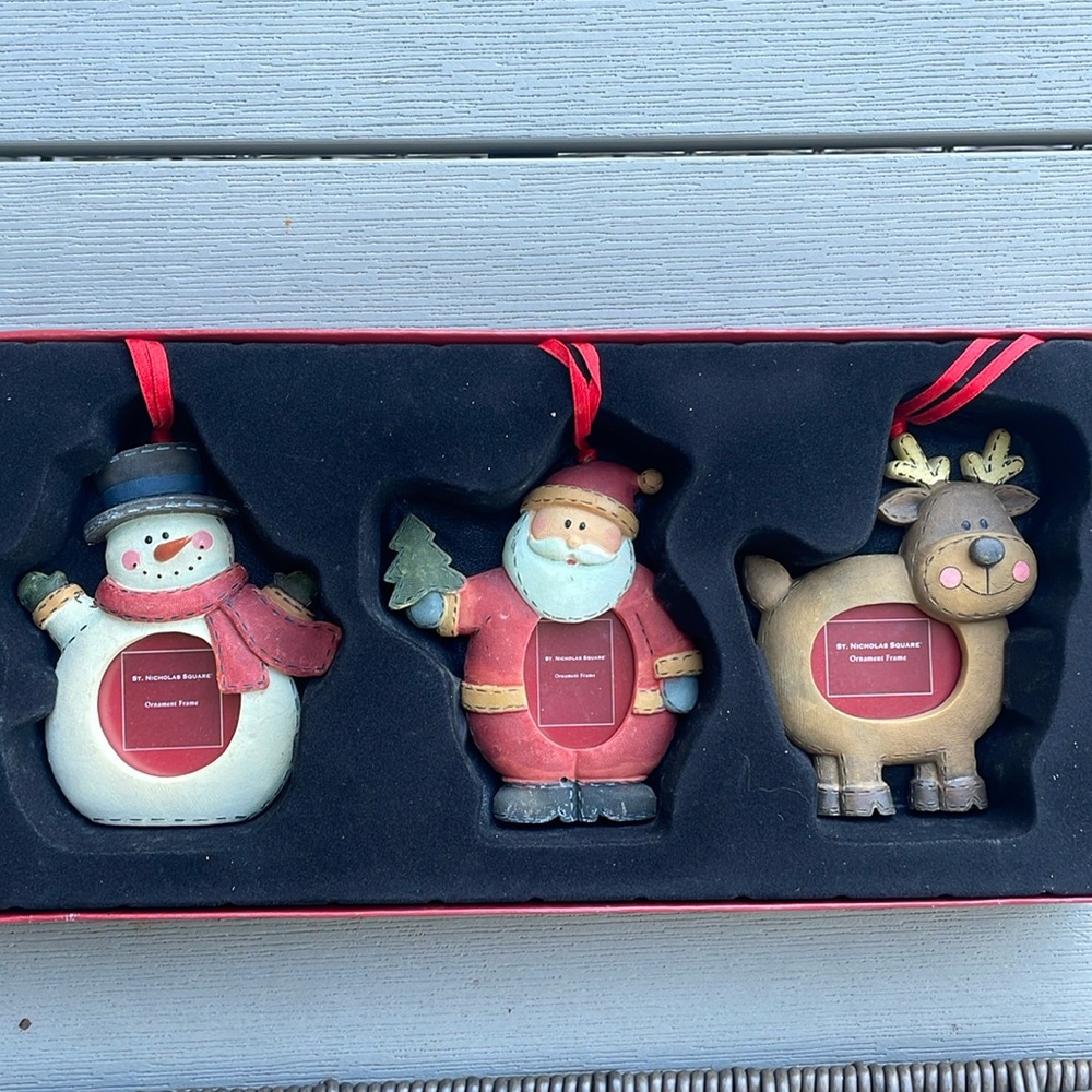 Christmas ornament frame tower. Snowman. Santa. Reindeer with red hanging string